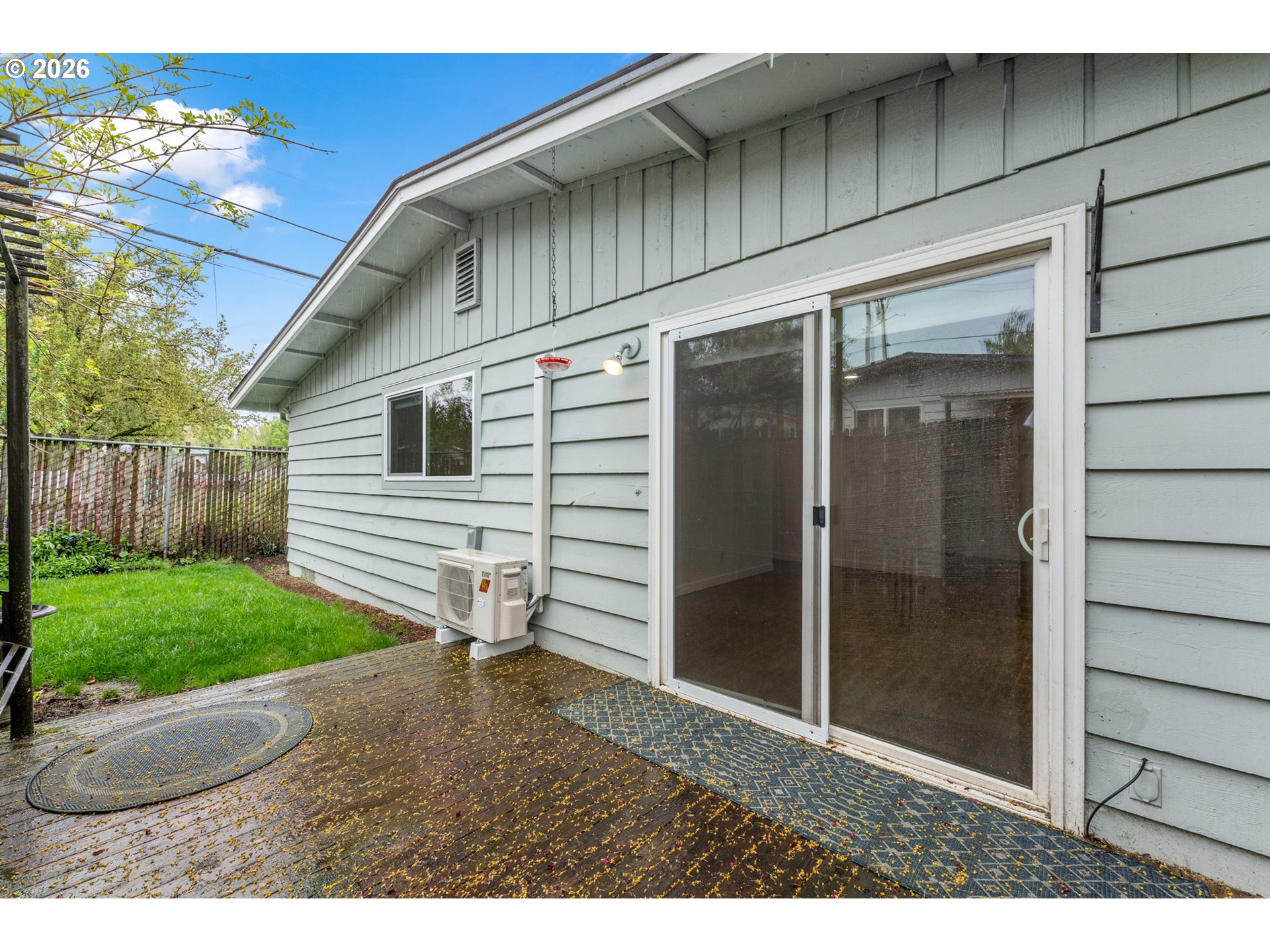 5566 Southwest Erickson Avenue Beaverton, OR 97005 - Photo 27 of 31 a backyard of a house with a garden and barbeque oven