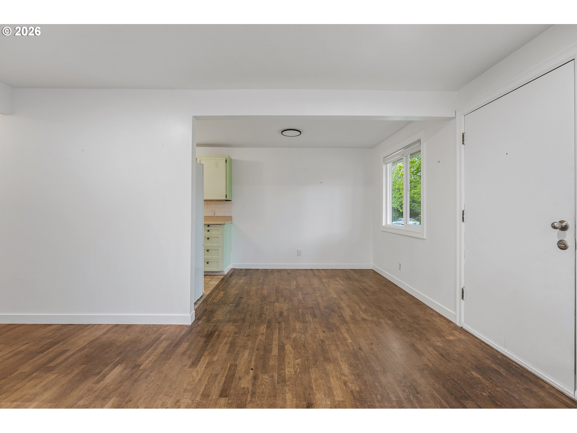 5566 Southwest Erickson Avenue Beaverton, OR 97005 - Photo 7 of 31 a view of an empty room and window