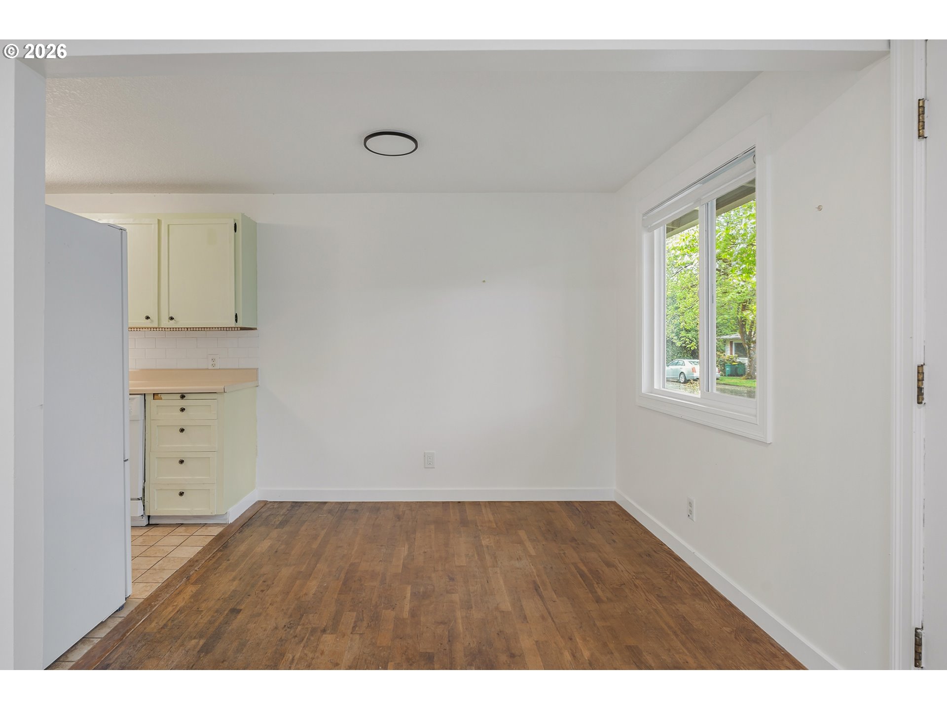 5566 Southwest Erickson Avenue Beaverton, OR 97005 - Photo 8 of 31 an empty room with a window
