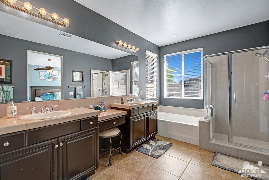 37388 Haweswater Road Indio, CA 92203 - Photo 14 of 28 a room with a sink and a mirror