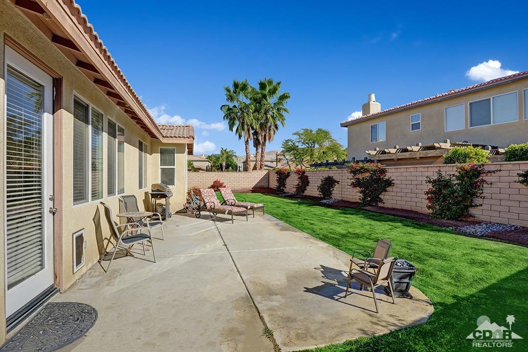 37388 Haweswater Road Indio, CA 92203 - Photo 3 of 28 a view of a patio with a table and chairs
