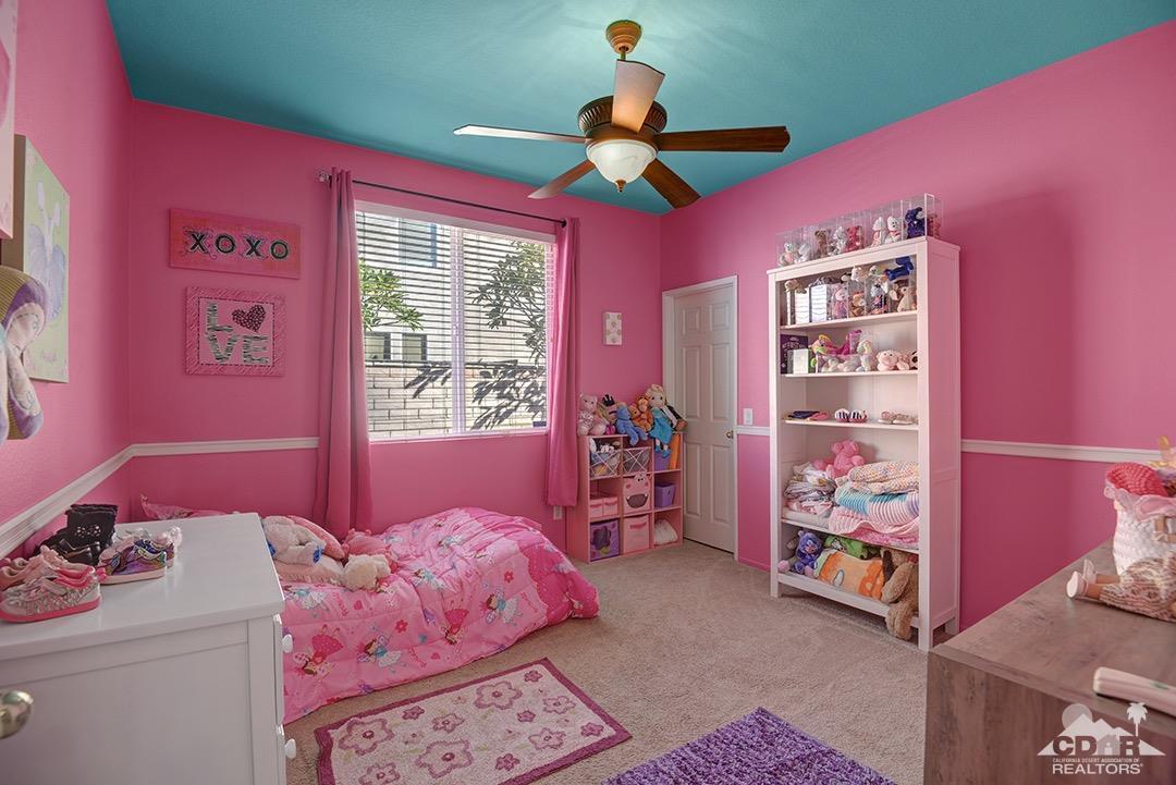37388 Haweswater Road Indio, CA 92203 - Photo 24 of 28 a bedroom with bed and a window