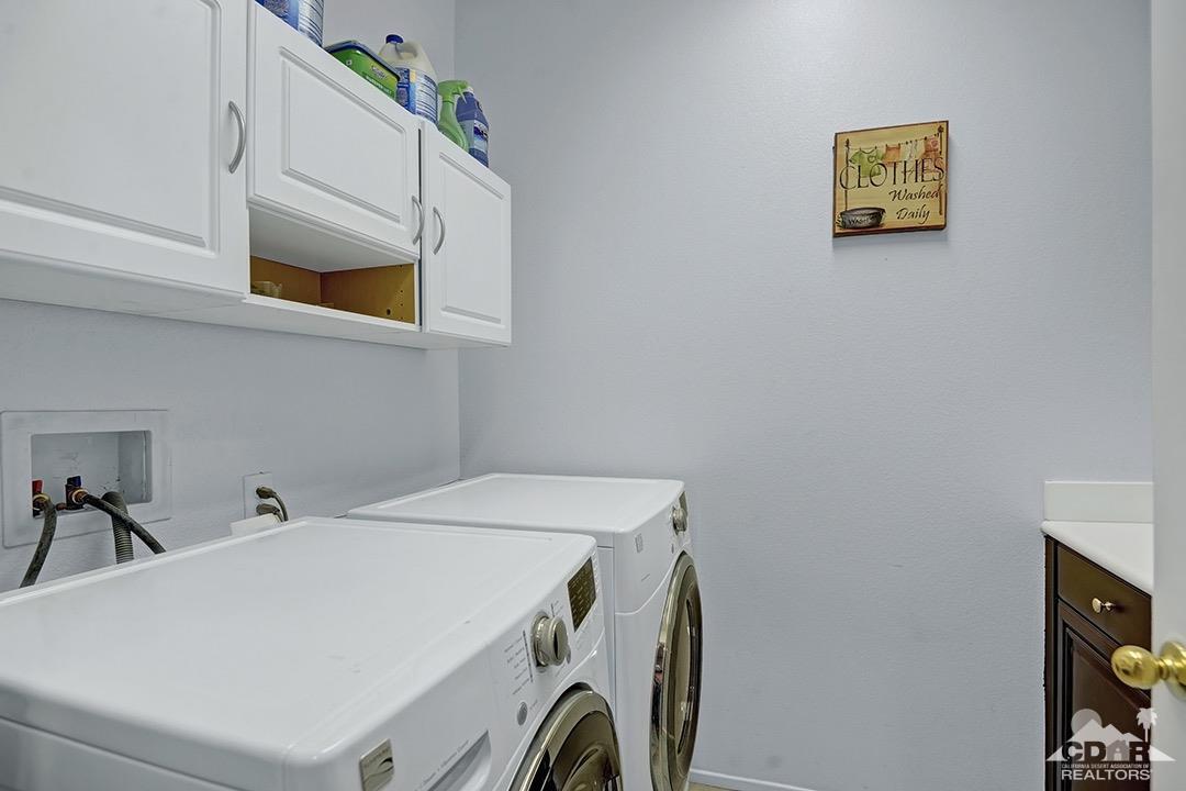 37388 Haweswater Road Indio, CA 92203 - Photo 25 of 28 a utility room with dryer and washer
