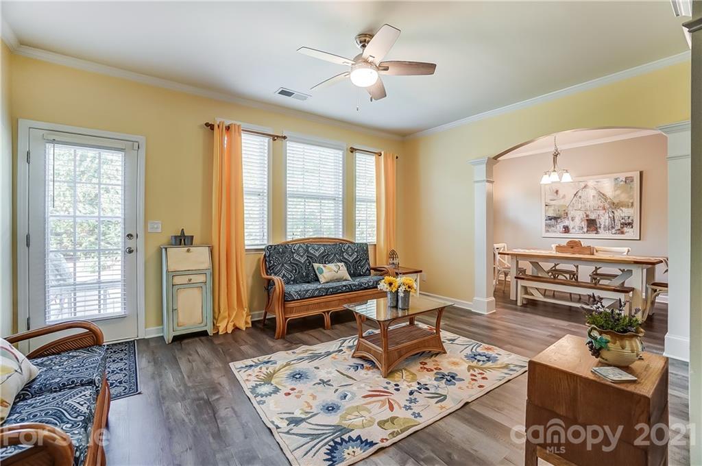 827 Solandra Way Fort Mill, SC 29708 - Photo 13 of 43 a living room with furniture and wooden floor