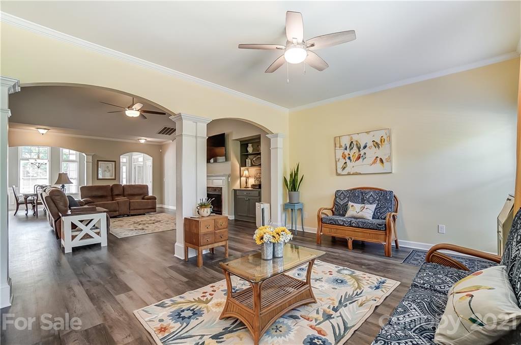 827 Solandra Way Fort Mill, SC 29708 - Photo 15 of 43 a living room with furniture and wooden floor