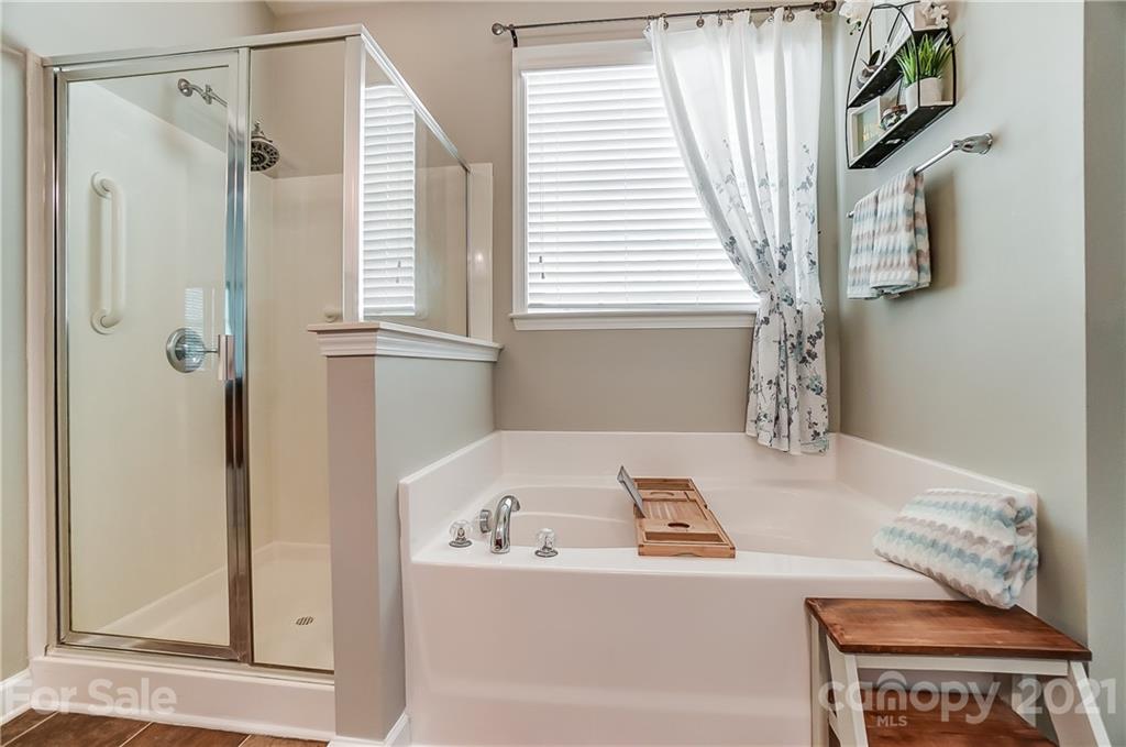 827 Solandra Way Fort Mill, SC 29708 - Photo 30 of 43 a bath tub sitting next to a window