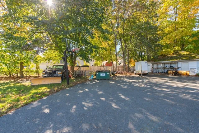a view of a street with houses on both side