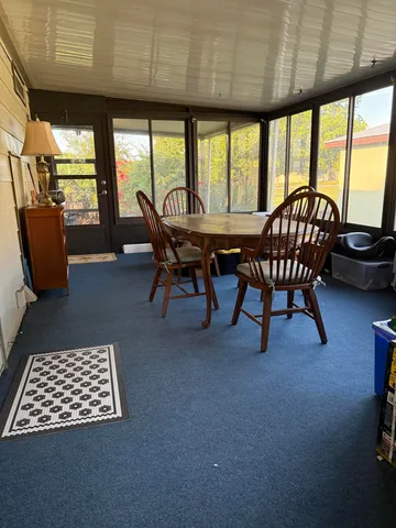 a view of a livingroom with furniture