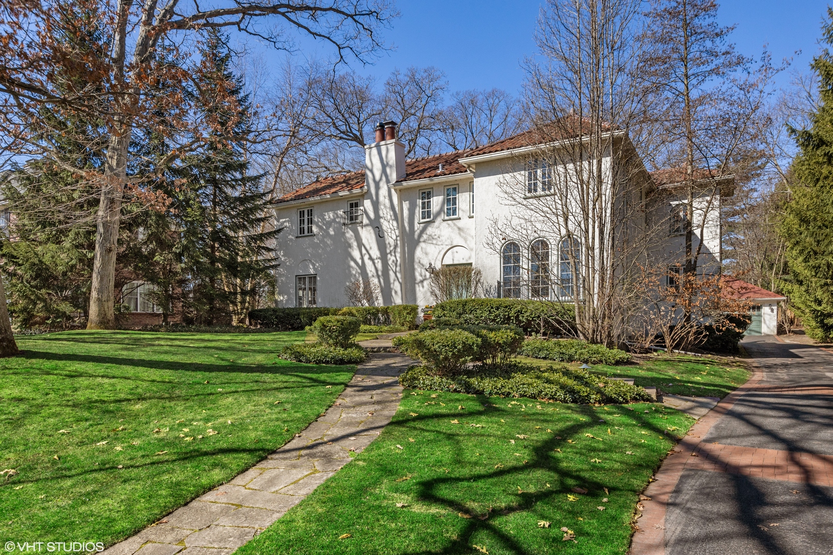 128 Church Road Winnetka, IL 60093 - Photo 1 of 46 a view of a house with a yard