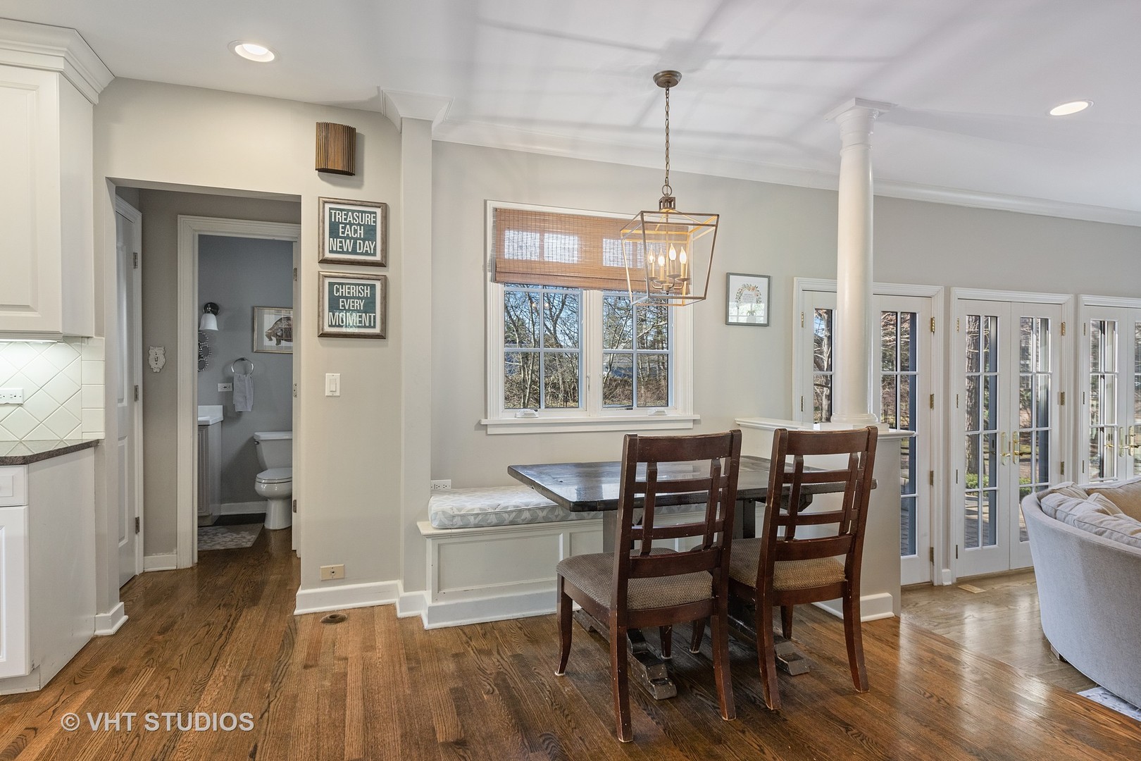 128 Church Road Winnetka, IL 60093 - Photo 15 of 46 a view of a dining room with furniture window and wooden floor