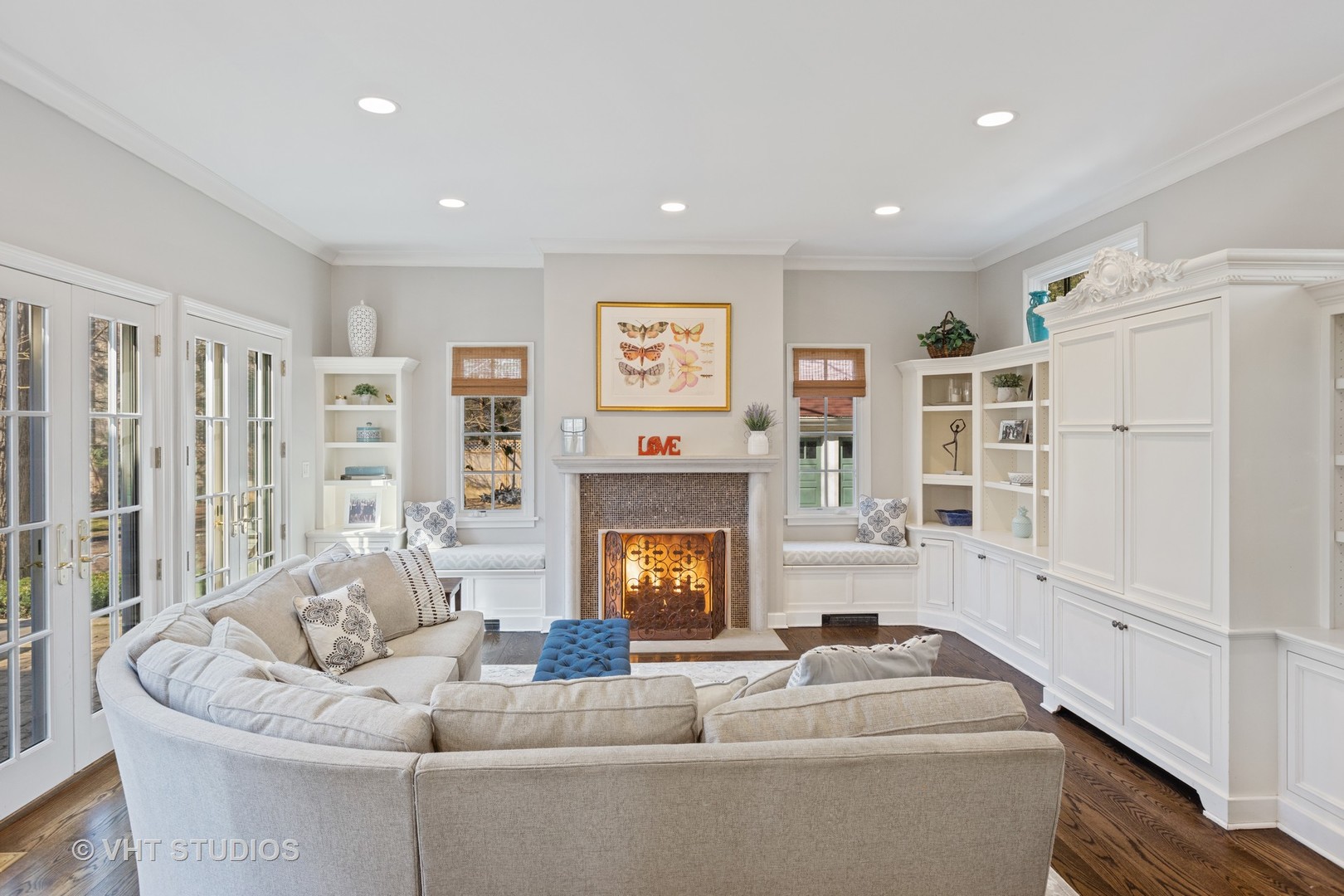 128 Church Road Winnetka, IL 60093 - Photo 16 of 46 a living room with furniture and a fireplace