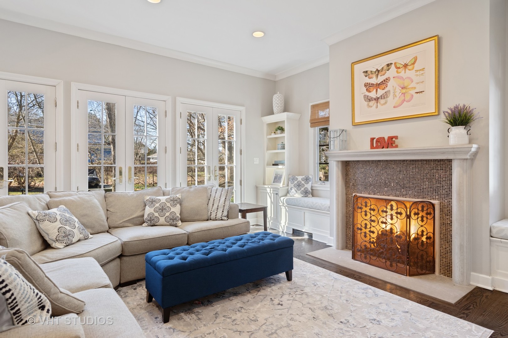 128 Church Road Winnetka, IL 60093 - Photo 17 of 46 a living room with furniture and a fireplace