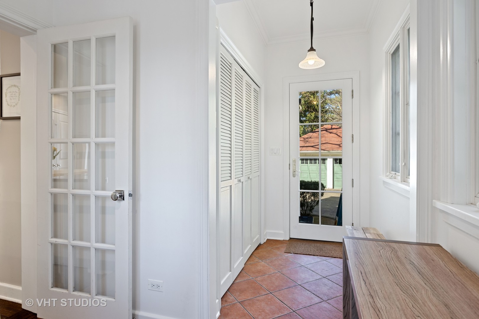 128 Church Road Winnetka, IL 60093 - Photo 21 of 46 a view of an entryway with wooden floor and a livingroom view