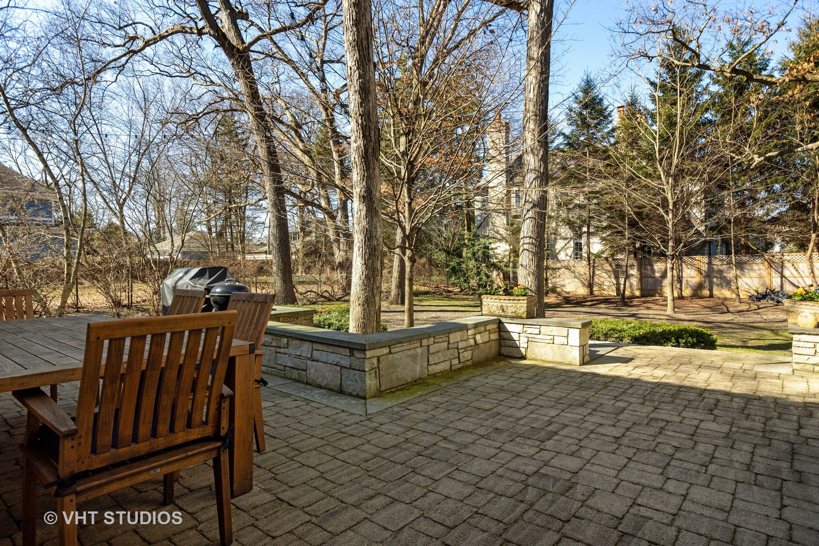 128 Church Road Winnetka, IL 60093 - Photo 38 of 46 a view of a swimming pool with a patio