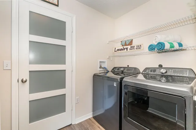 a kitchen with a stove and a microwave