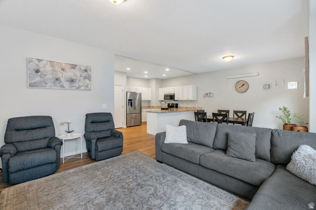 11007 Birch Creek Road South Jordan, UT 84095 - Photo 3 of 35 Spacious great room is designed for both everyday living.