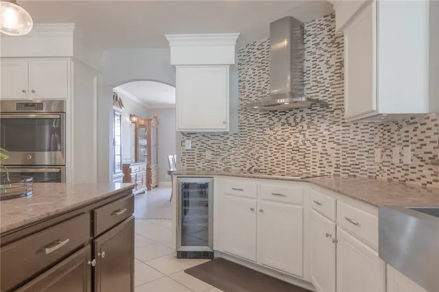 a bathroom with a granite countertop sink a vanity and a mirror
