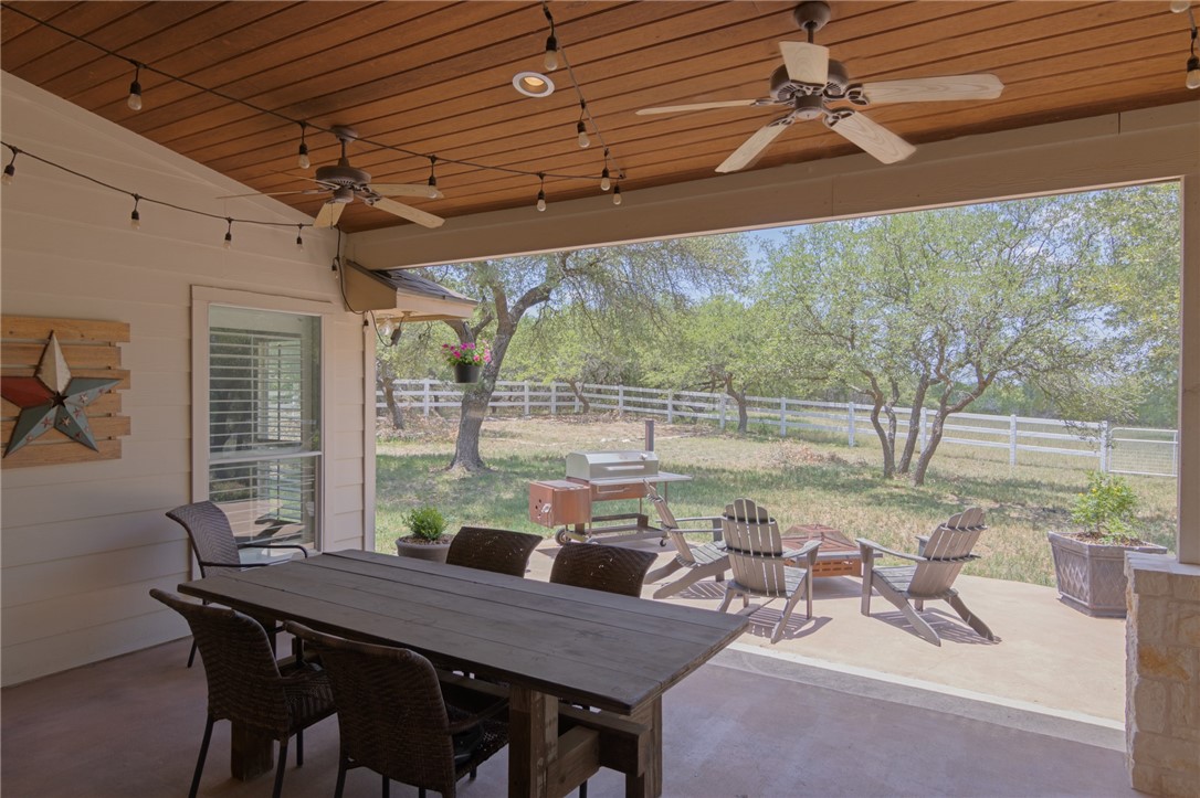 550 Hays Country Acres Road Dripping Springs, TX 78620 - Photo 30 of 40 a view of a dining room with furniture window and outside view