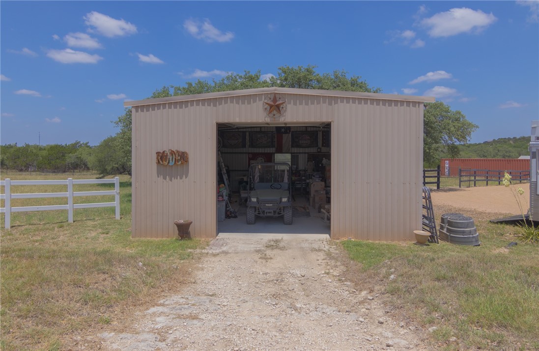 550 Hays Country Acres Road Dripping Springs, TX 78620 - Photo 5 of 40 a view of a house with a yard