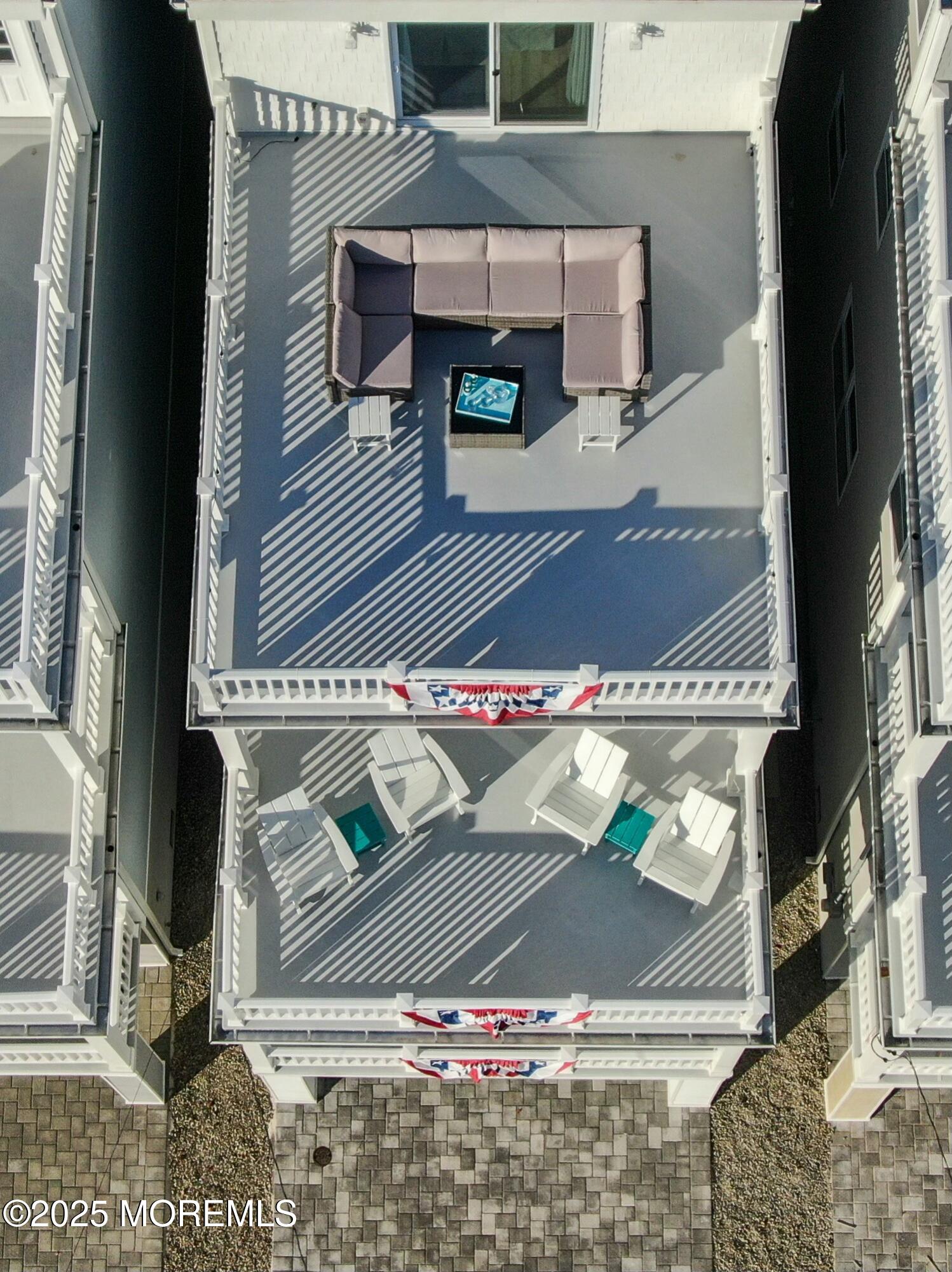 a view of a balcony with an outdoor space