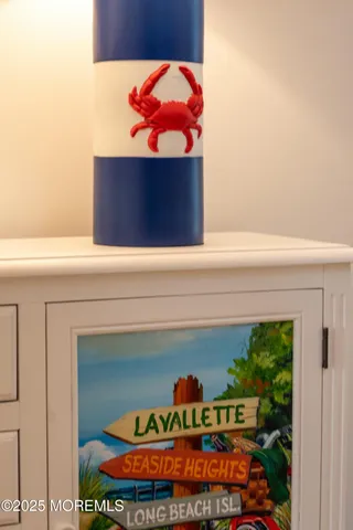 a roof deck with couches and wooden floor