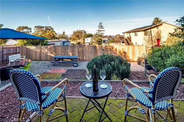 an aerial view of residential houses and outdoor space