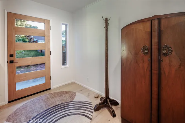 a bathroom with a sink vanity and a mirror