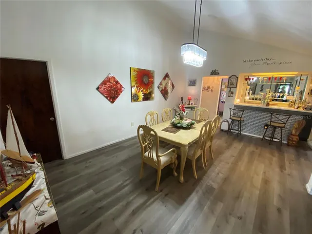 a kitchen that has a sink and a stove in it