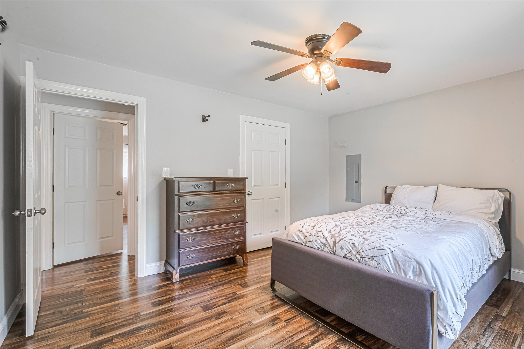 24314 Anderson Street Huffman, TX 77336 - Photo 45 of 48 a bedroom with a bed and a ceiling fan