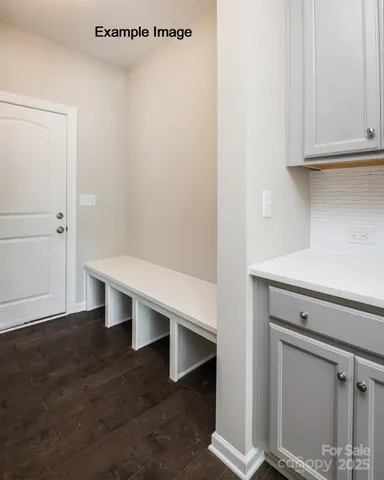 a view of entryway with wooden floor
