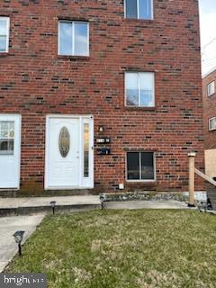 216 Boro Road, Unit A Secane, PA 19018 - Photo 9 of 26 a view of a brick house with two windows