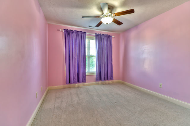 2515 St Andrews Road Urbana, IL 61802 - Photo 29 of 50 an empty room with windows and fan