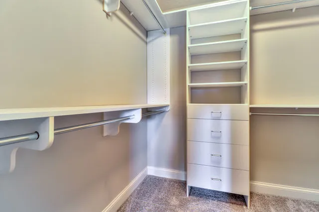 a view of an empty walk in closet