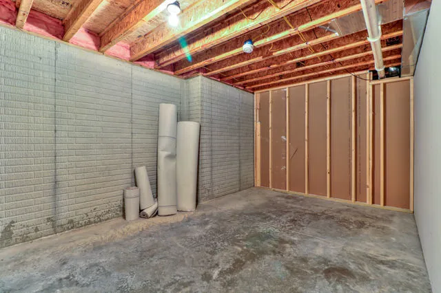 a view of a room with wooden walls