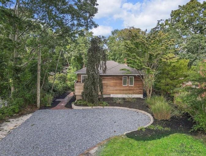 59 Riverside Avenue Mastic Beach, NY 11951 - Photo 1 of 1 a view of a house with a yard