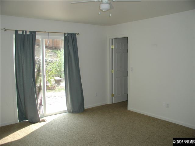 1214 Secluded Circle Reno, NV 89509 - Photo 3 of 9 a view of an empty room with a window
