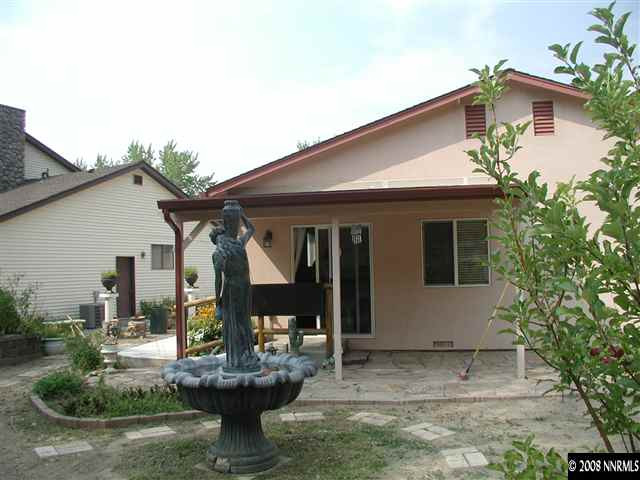 1214 Secluded Circle Reno, NV 89509 - Photo 9 of 9 a front view of house with outdoor seating