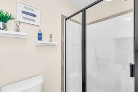 a bathroom with a toilet and a sink