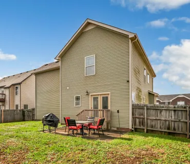 a front view of house with yard
