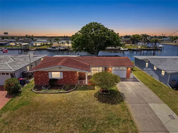 $300,000 | 12813 3rd Isle, Hudson, FL 34667