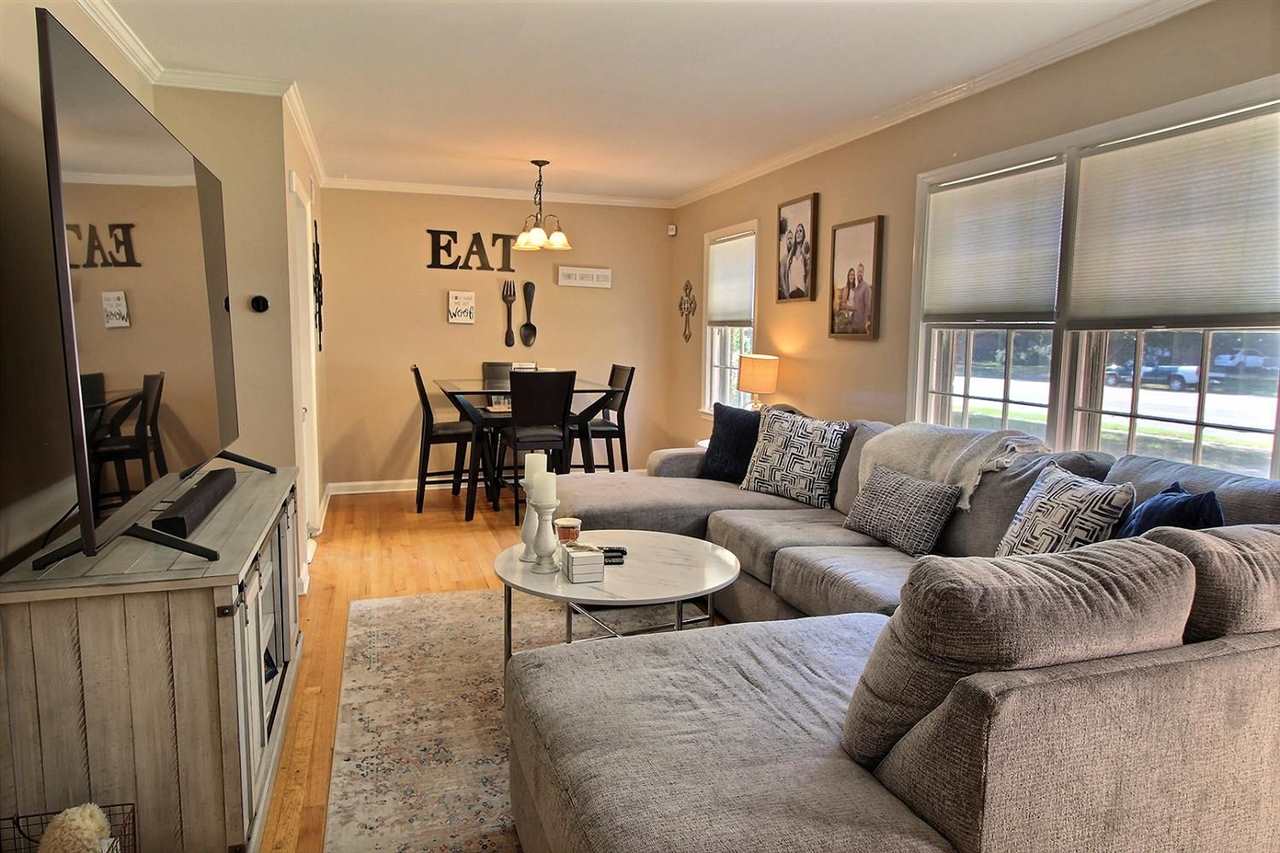 1654 Colonial Road Memphis, TN 38117 - Photo 2 of 14 a living room with furniture and wooden floor
