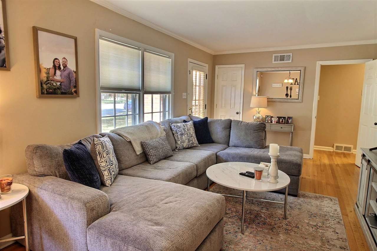 1654 Colonial Road Memphis, TN 38117 - Photo 3 of 14 a living room with furniture and a large window