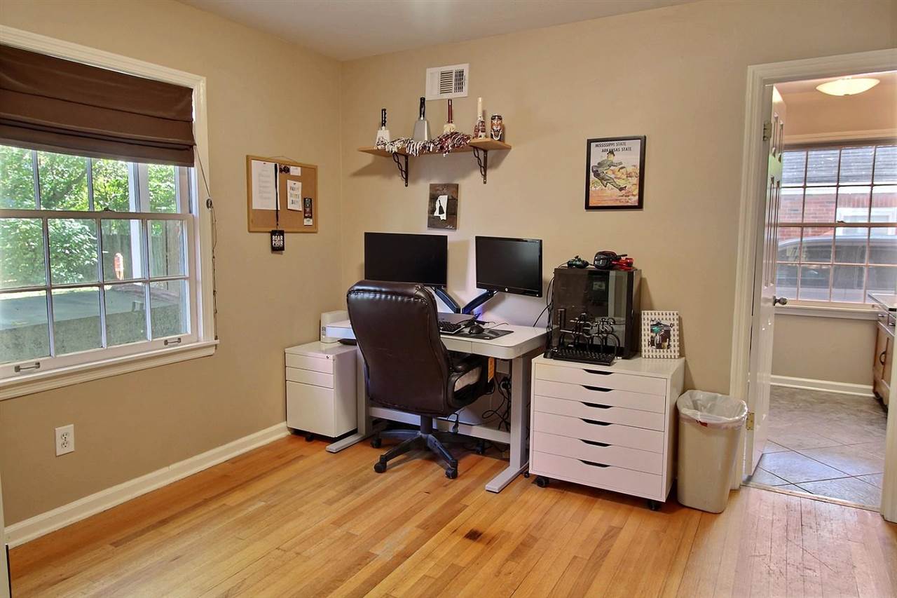 1654 Colonial Road Memphis, TN 38117 - Photo 7 of 14 a view of a workspace with furniture and a window