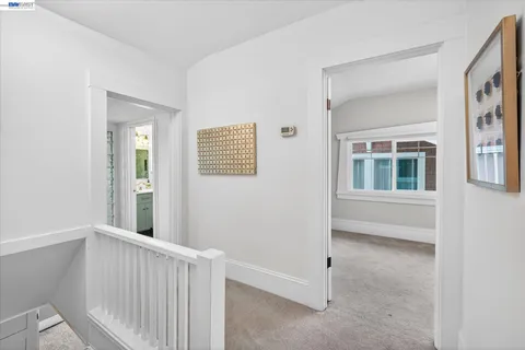 a view of a hallway with windows