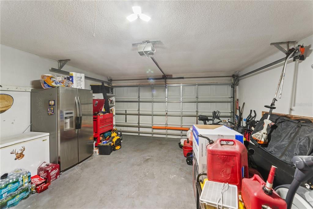 8715 Huntsman Lane Port Richey, FL 34668 - Photo 48 of 54 a storage room with storage and utility