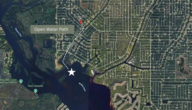 a sign that is sitting on a brick wall