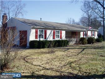 94 Democrat Road Mickleton, NJ 08056 - Photo 1 of 12 a front view of a house with garden