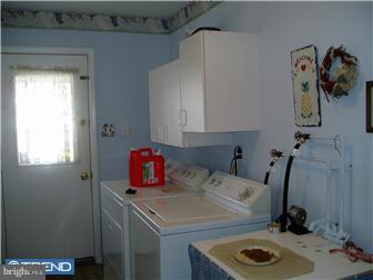 94 Democrat Road Mickleton, NJ 08056 - Photo 9 of 12 a bathroom with a sink and a mirror