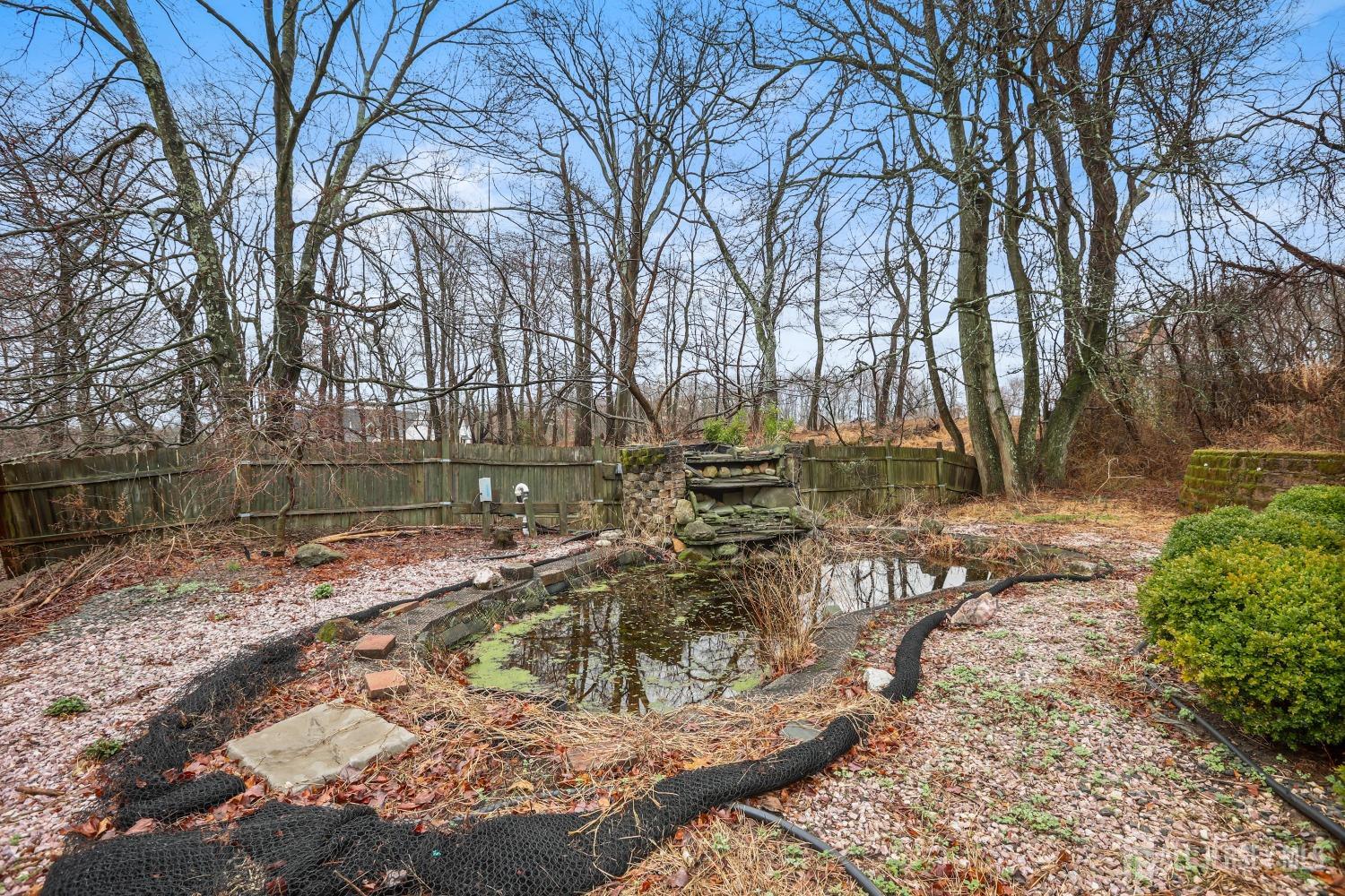 75 Baird Road Millstone Township, NJ 08535 - Photo 24 of 30 a view of a yard with large trees