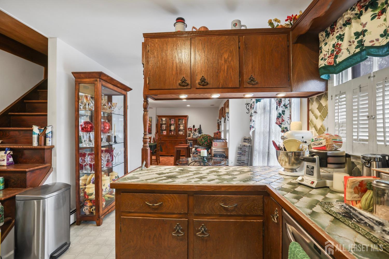 75 Baird Road Millstone Township, NJ 08535 - Photo 6 of 30 a kitchen with a sink and cabinets